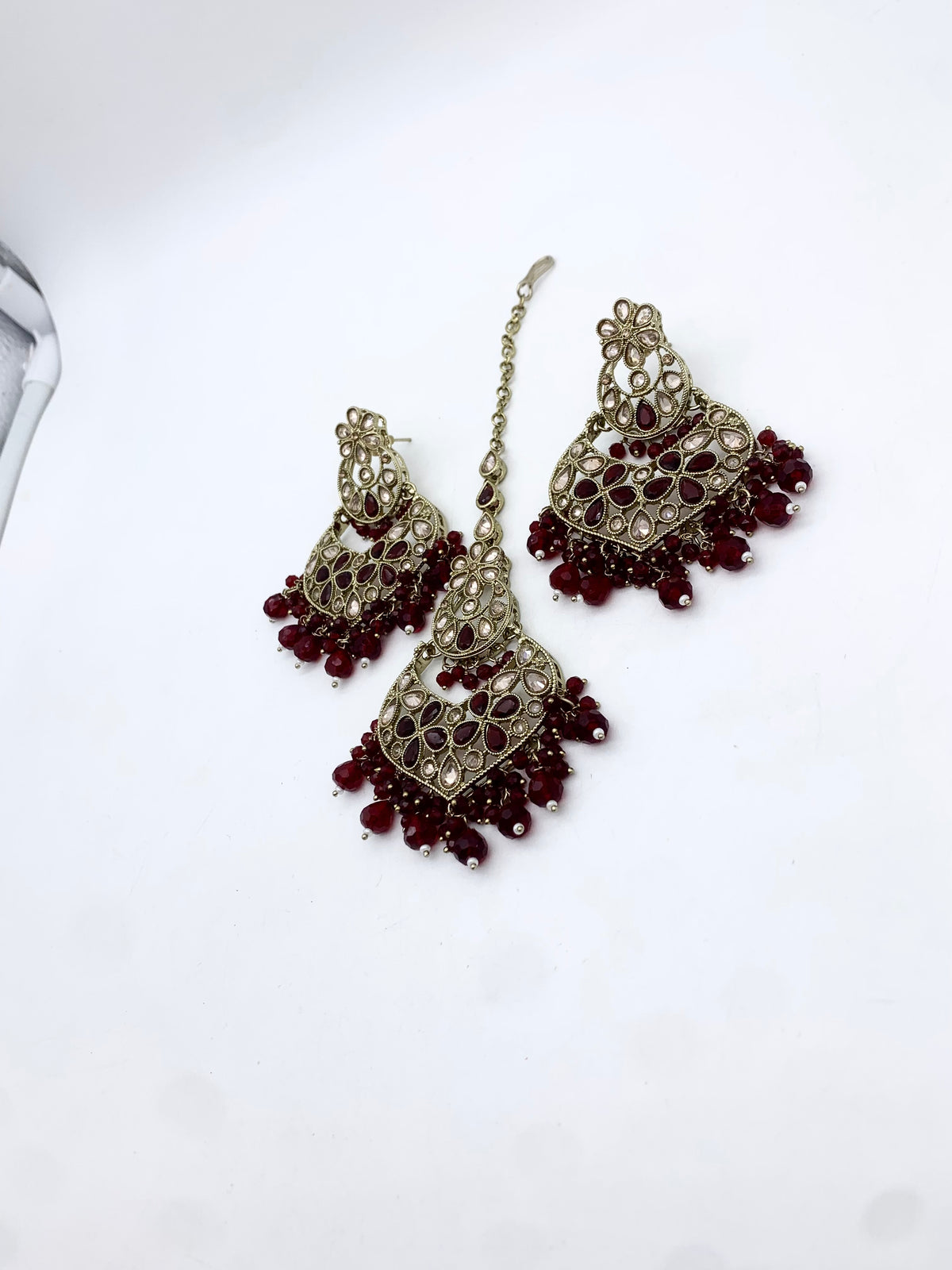 AM600 Gold and Maroonearrings and tikka set