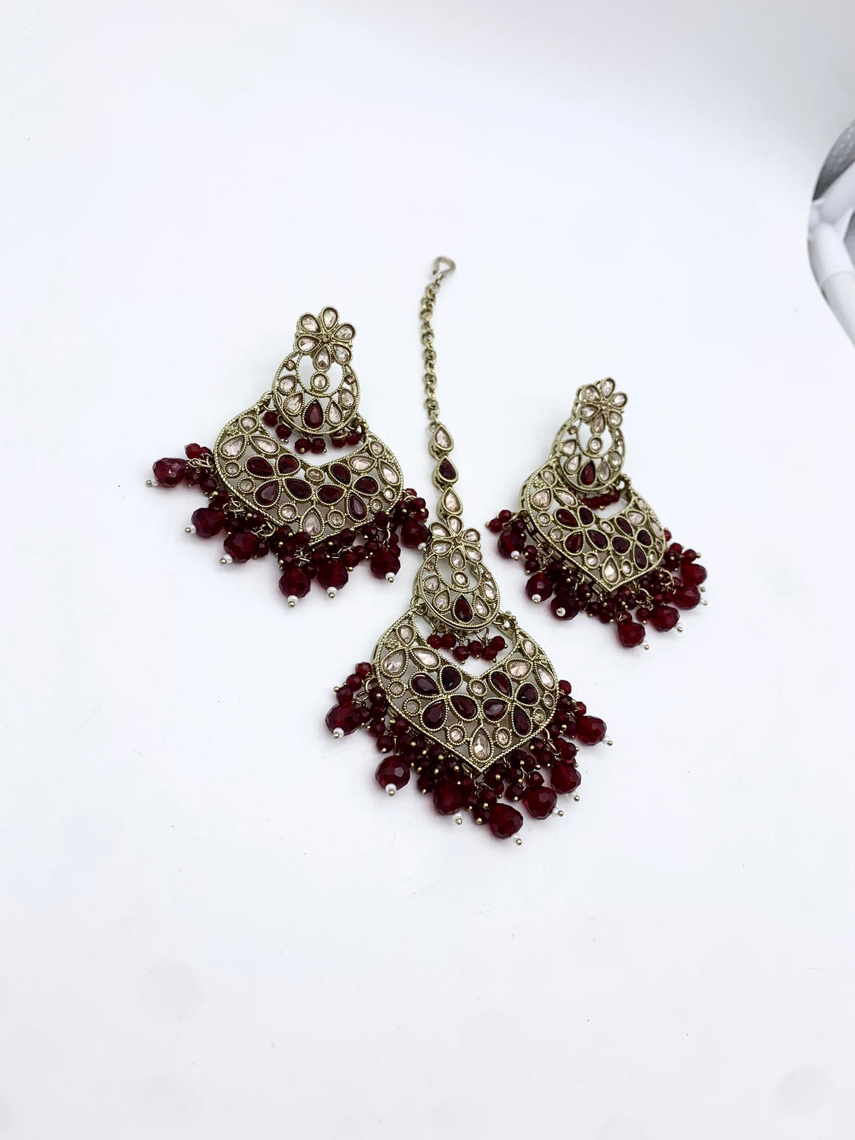AM600 Gold and Maroonearrings and tikka set