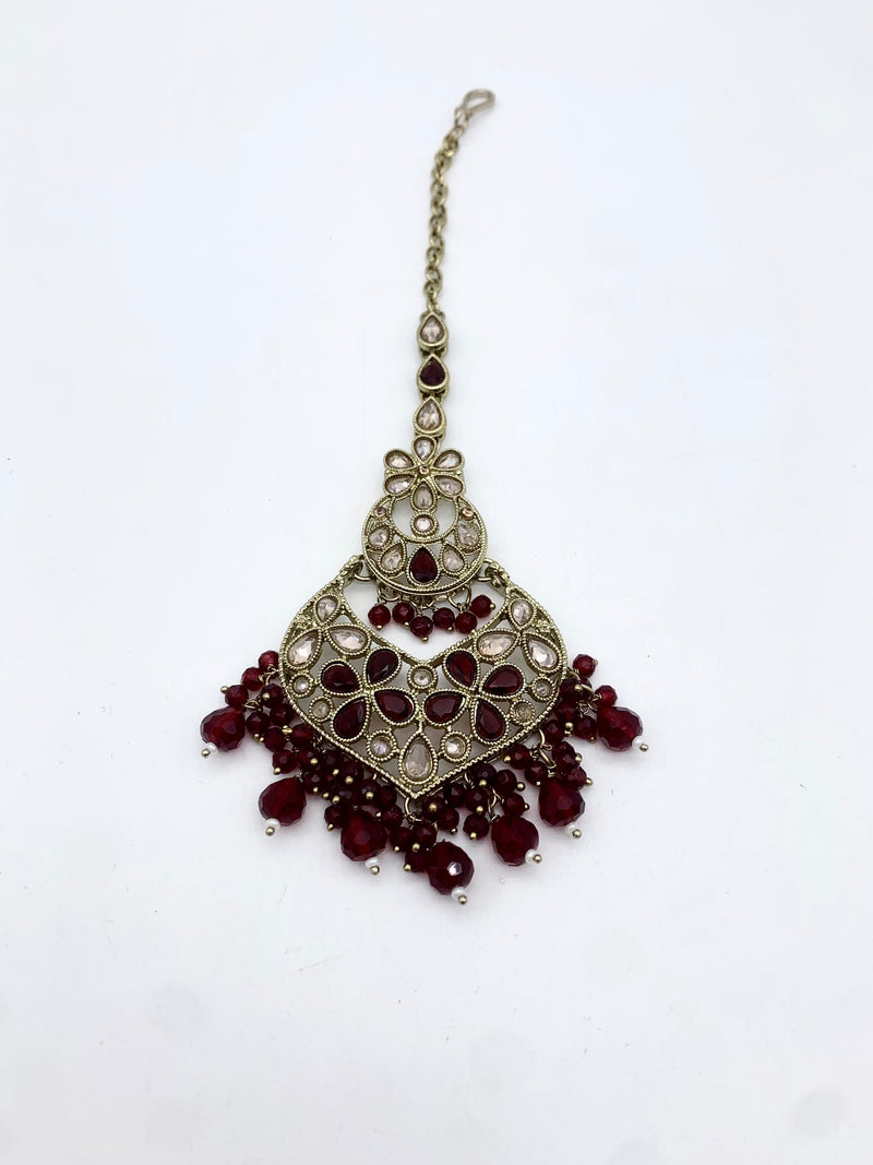 AM600 Gold and Maroonearrings and tikka set