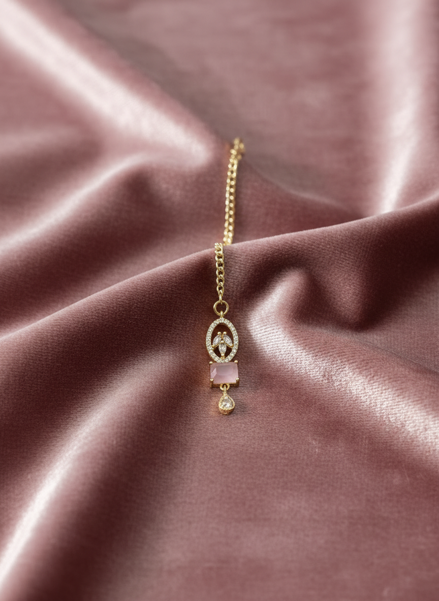 AM670 Gold and Pink tikka American Diamond