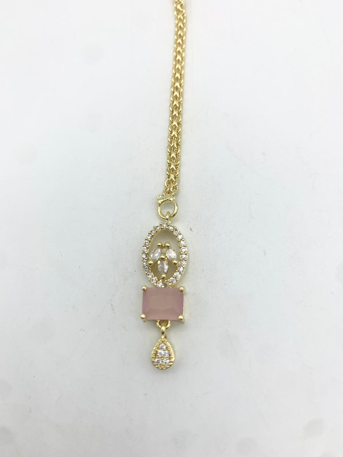 AM670 Gold and Pink tikka American Diamond