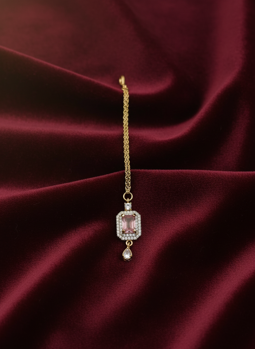 AM668 Gold and Pink tikka American diamond